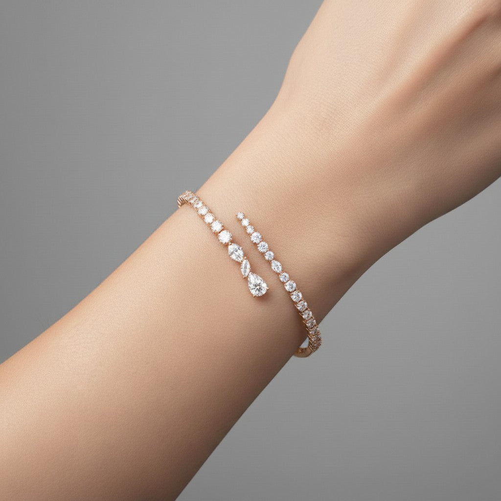 My Store 4 contemporary bypass bangle featuring mixed-cut diamonds in a rose gold setting worn on a wrist.