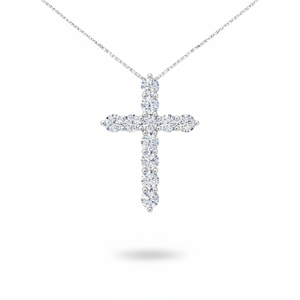 My Store 4 diamond cross pendant necklace featuring round brilliant diamonds in a shared-prong white gold setting.
