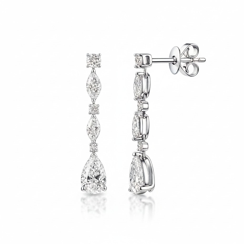 My Store 4 bridal drop earrings featuring marquise, round, and pear-cut diamonds set in polished white gold.