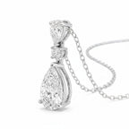 My Store 4 three-stone diamond drop pendant necklace in 18K white gold with pear and round cut stones.