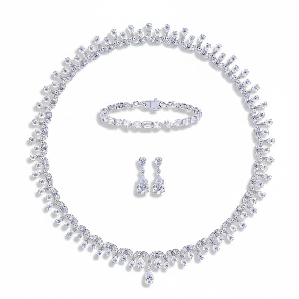 My Store 4 bridal jewelry set featuring a diamond fringe necklace, pear drop earrings, and a multi-cut tennis bracelet.