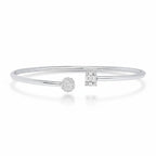 My Store 4 open cuff bracelet in white gold with a round diamond cluster and a rectangular baguette diamond motif.