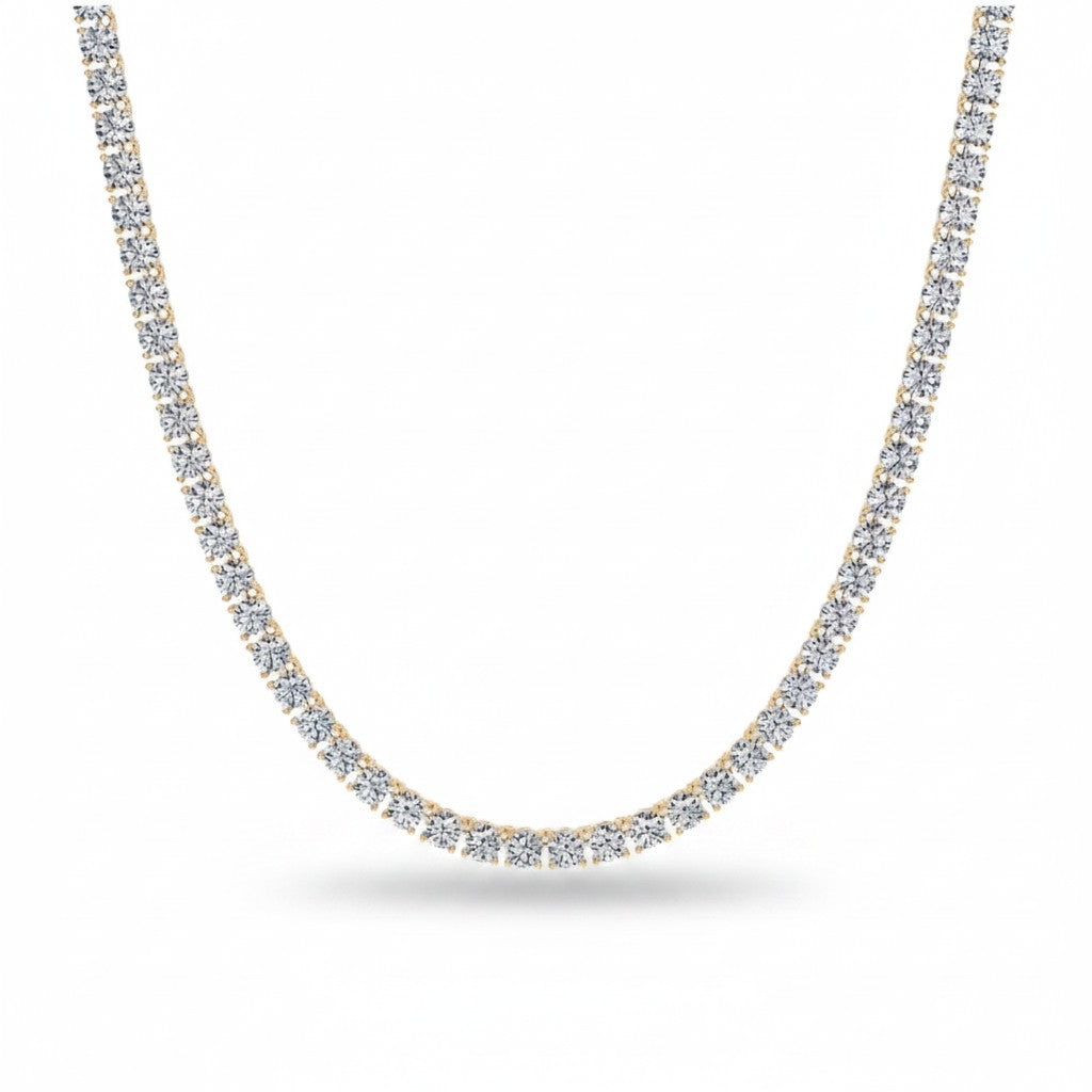 My Store 4 classic diamond tennis necklace featuring a continuous line of round brilliant diamonds in gold settings.