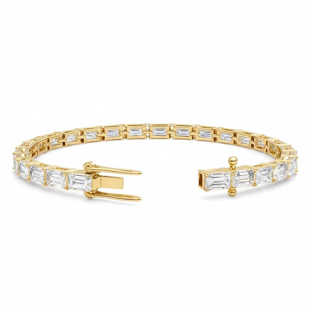 My Store 4 modern yellow gold line bracelet featuring horizontally set emerald-cut diamonds with a secure box clasp.