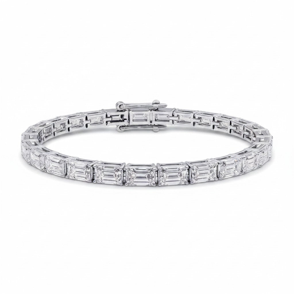 My Store 4 modern east-west emerald cut diamond line bracelet in polished white gold with a secure box clasp.