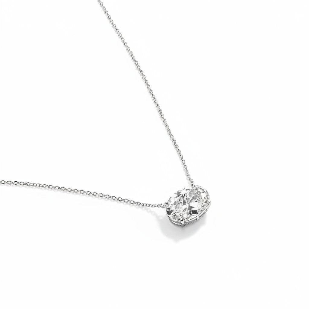 My Store 4 oval-cut diamond solitaire pendant necklace in a horizontal East-West setting on a fine white gold chain.