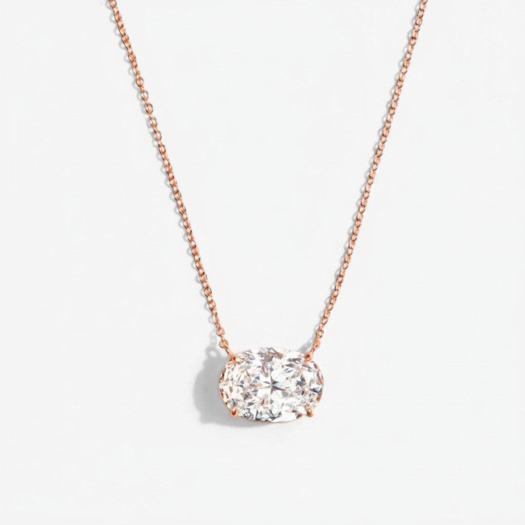 My Store 4 oval diamond solitaire pendant necklace featuring a horizontal east-west setting on a fine gold chain.