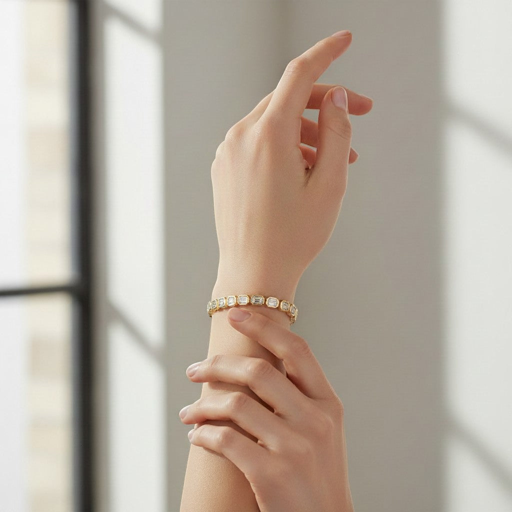 My Store 4 18K gold tennis bracelet featuring emerald-cut lab-grown diamonds in sleek bezel settings on a wrist