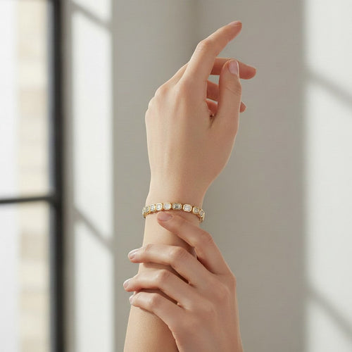 My Store 4 18K gold tennis bracelet featuring emerald-cut lab-grown diamonds in sleek bezel settings on a wrist