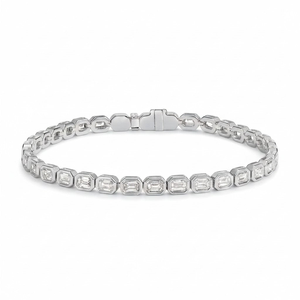 My Store 4 18K solid gold tennis bracelet featuring 3 carats of emerald-cut lab-grown diamonds in bezel settings.