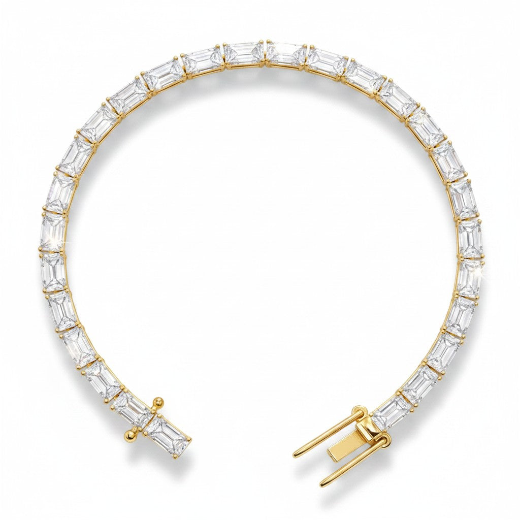 My Store 4 modern east-west emerald cut diamond bracelet in yellow gold with a secure box clasp and safety catches.