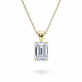 My Store 4 emerald-cut diamond solitaire pendant in 18K yellow gold on a matching fine cable chain.