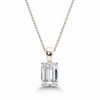 My Store 4 emerald-cut diamond solitaire pendant in 18K gold with a tapered bail on a delicate cable chain