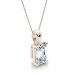 My Store 4 emerald-cut diamond solitaire pendant in 18K gold with a tapered bail on a fine cable chain
