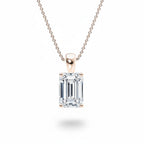 My Store 4 emerald-cut diamond solitaire pendant in 18K yellow gold with a tapered bail on a fine cable chain.
