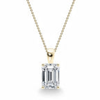 My Store 4 emerald-cut diamond solitaire pendant in 18K yellow gold with a tapered bail on a fine cable chain.