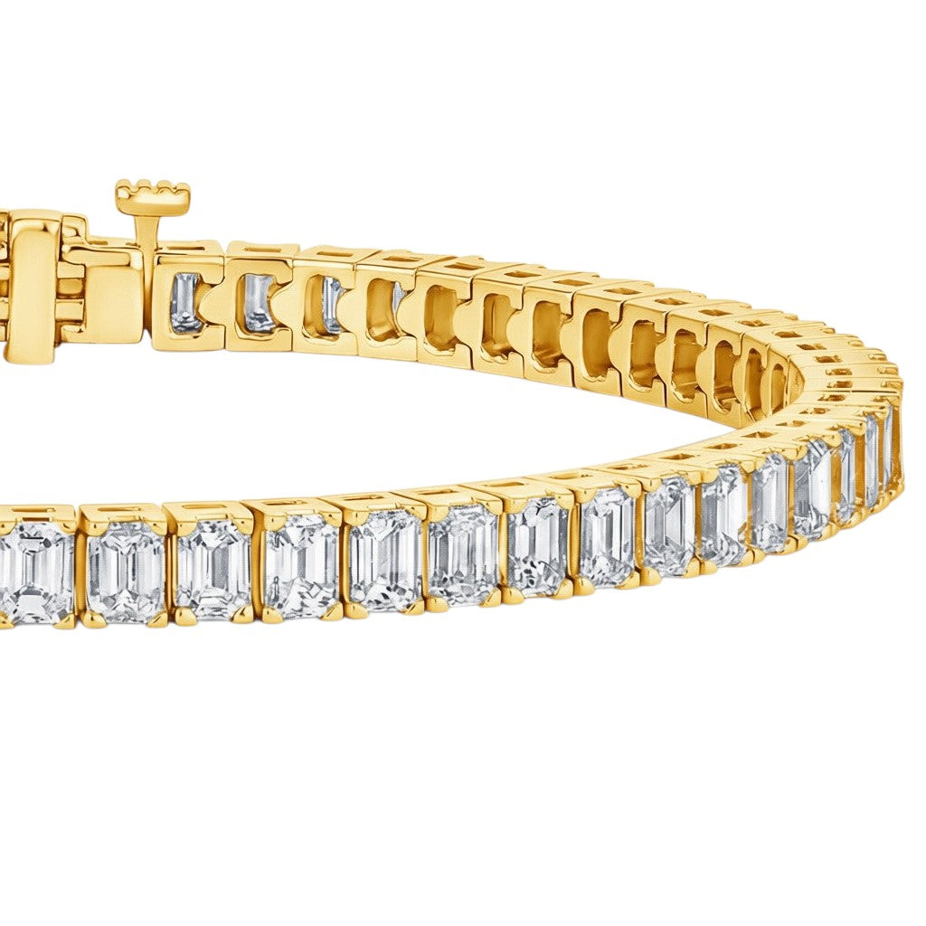 My Store 4 custom tennis bracelet featuring emerald-cut diamonds set in polished 14K yellow gold with a box clasp.