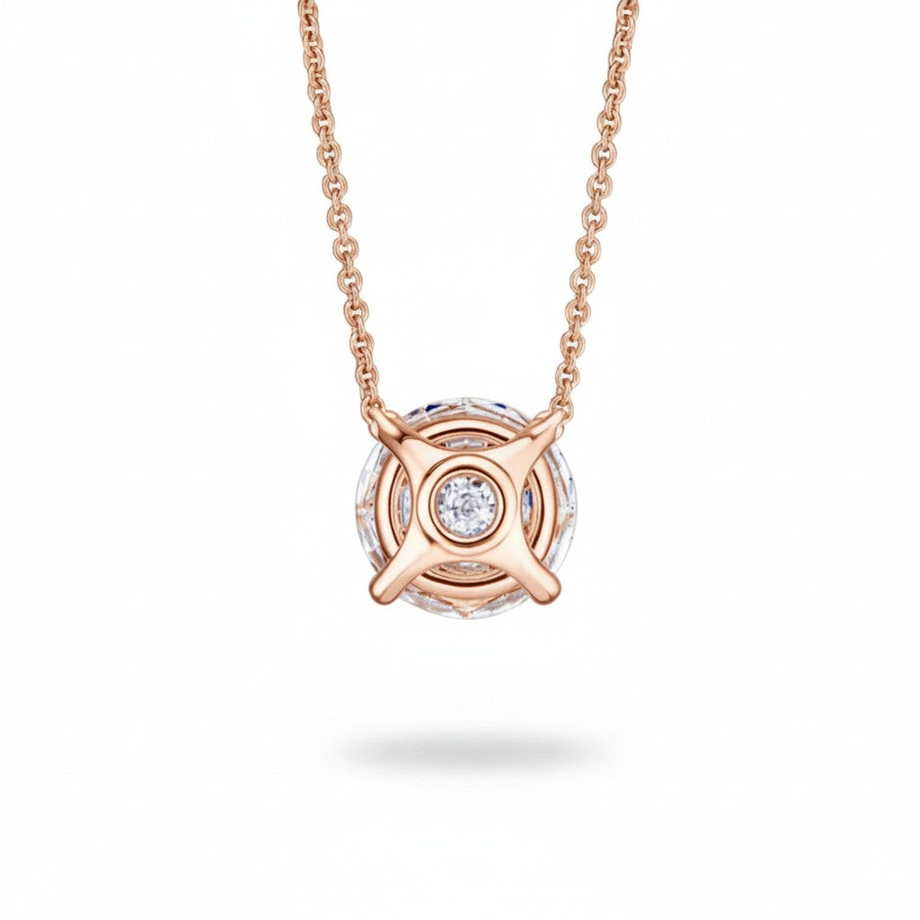 My Store 4 round floating diamond solitaire pendant in 18k rose gold with a minimalist four-prong wire basket setting.