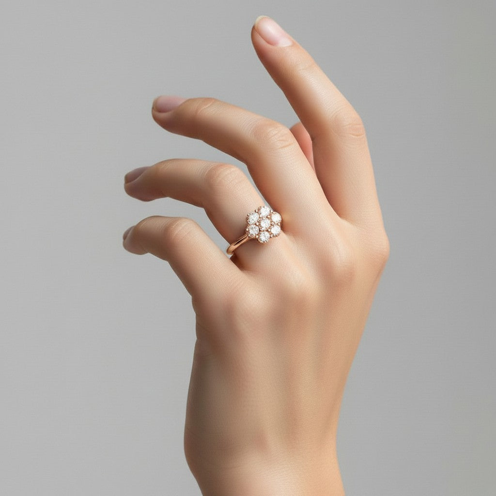 My Store 4 floral cluster engagement ring with seven brilliant-cut stones on a polished solid gold tapered band.
