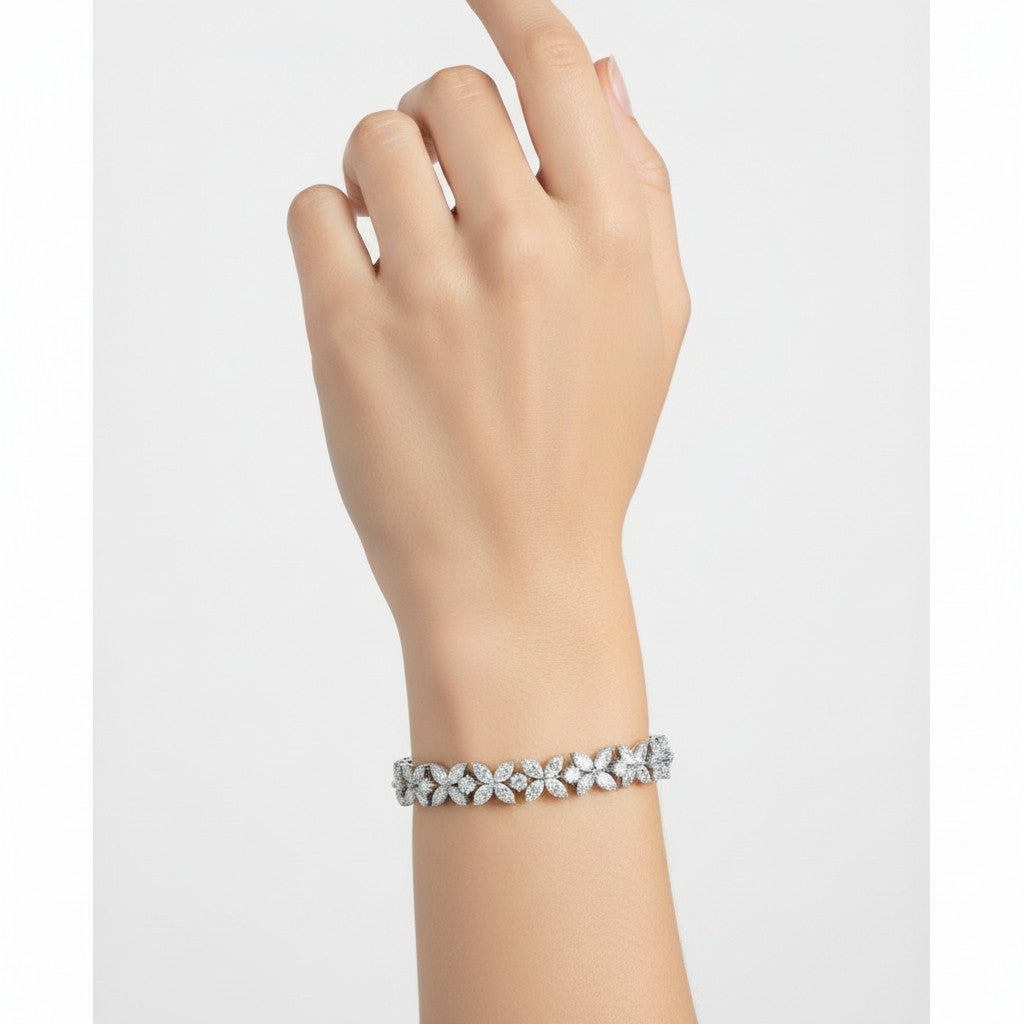 My Store 4 Bloomline floral diamond line bracelet featuring marquise and round cut clusters on a woman's wrist.