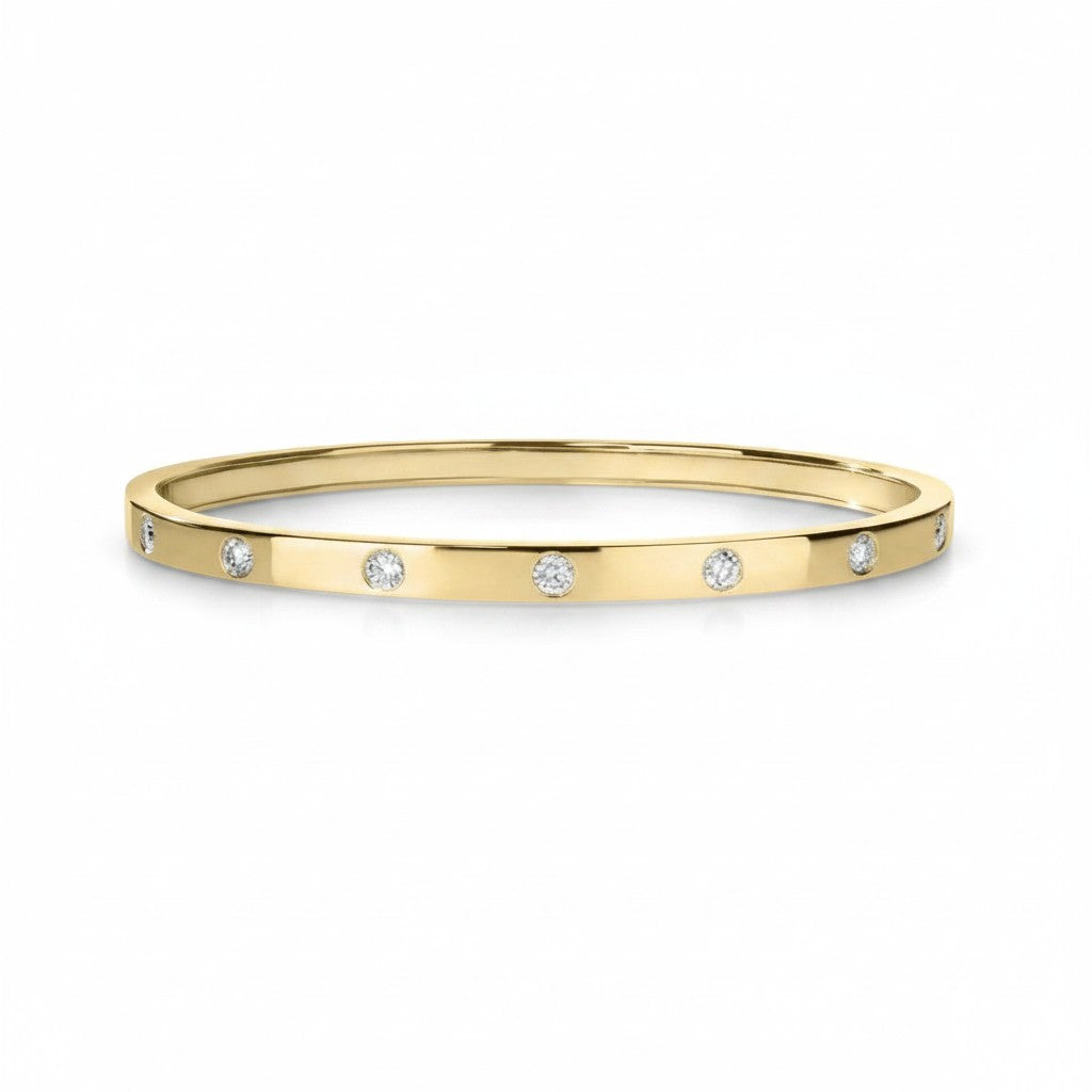 My Store 4 round flush set diamond bangle bracelet in polished yellow gold with a sleek, snag-free design.