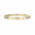My Store 4 round flush set diamond bangle bracelet in polished yellow gold with a sleek, snag-free design.