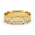My Store 4 solid yellow gold flat band ring featuring an offset channel of brilliant round diamonds.