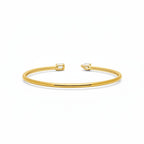 My Store 4 open cuff bracelet in yellow gold with an asymmetrical pear-cut and emerald-cut diamond focal point.