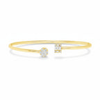 My Store 4 open cuff bracelet in yellow gold featuring a round diamond cluster and a rectangular baguette diamond motif.