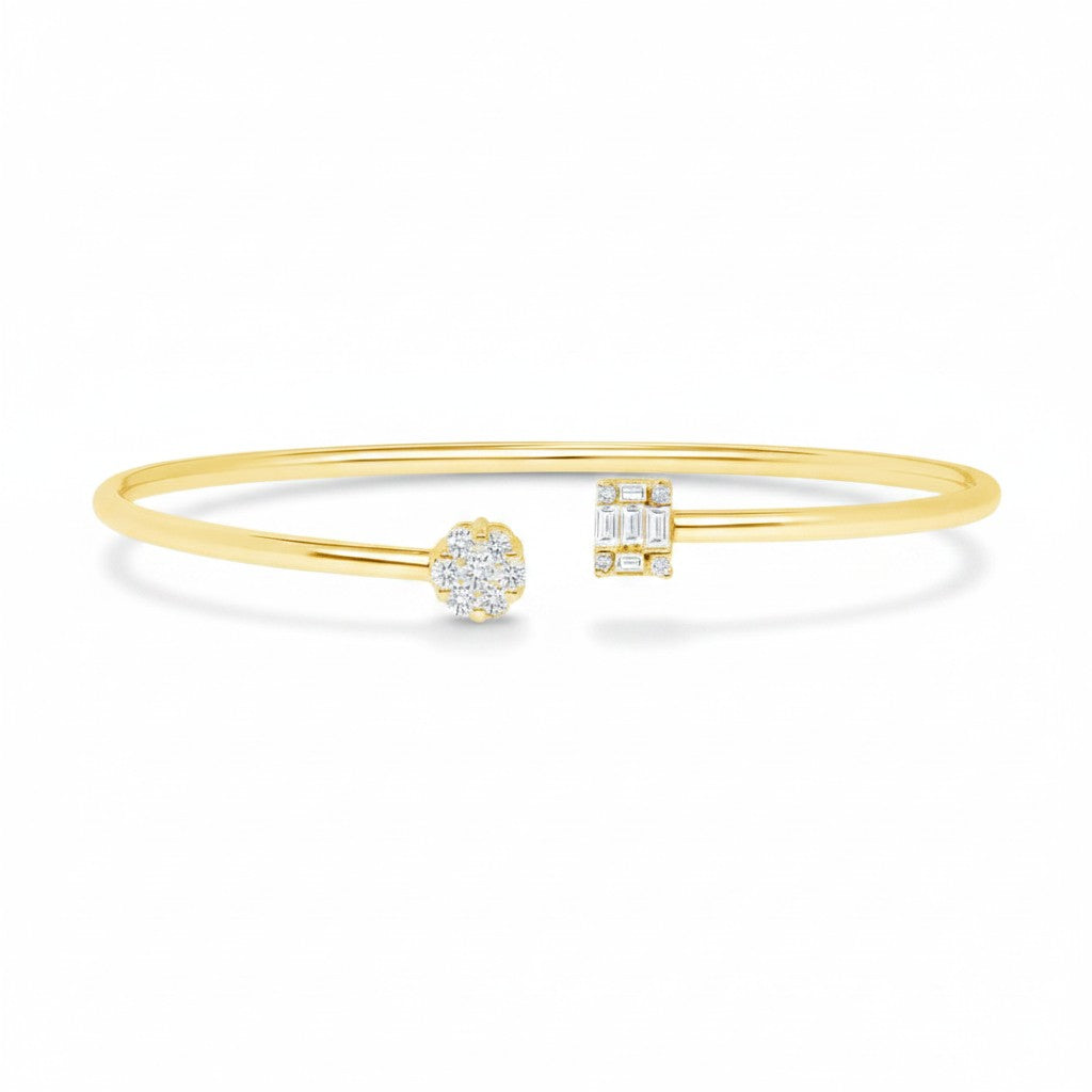 My Store 4 open cuff bracelet in yellow gold featuring a round diamond cluster and a rectangular baguette diamond motif.