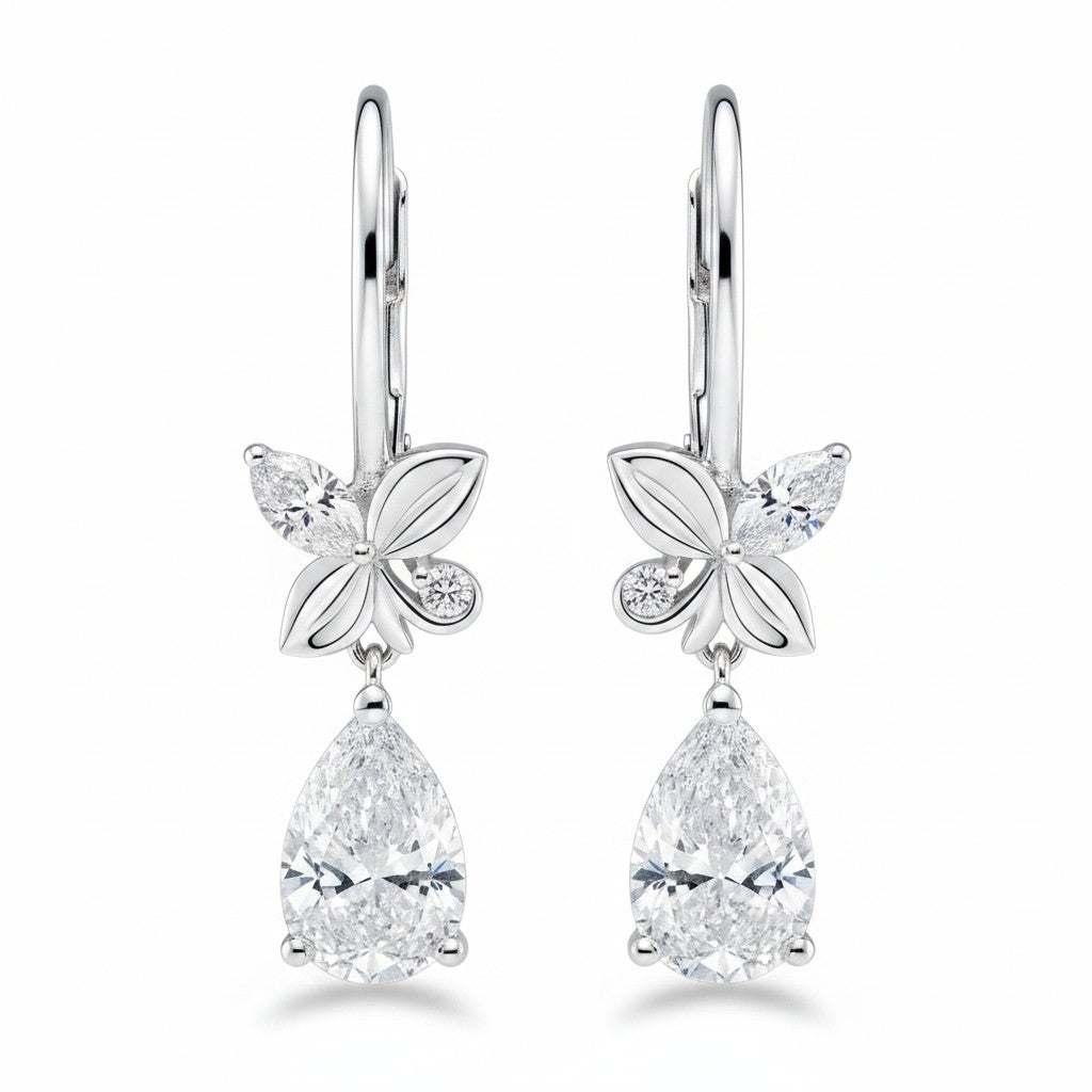 My Store 4 18K solid gold drop earrings featuring pear-cut lab-grown diamonds and delicate butterfly accents.