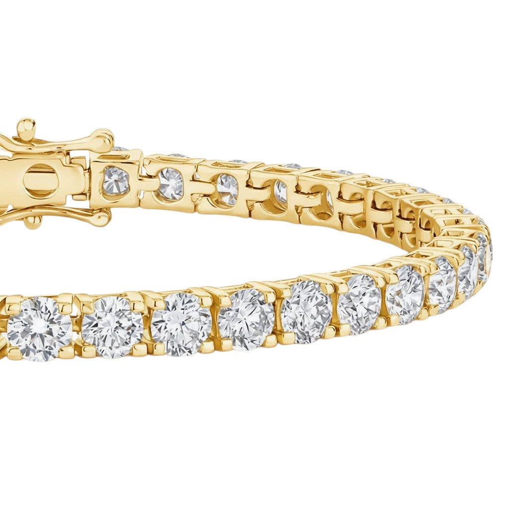 My Store 4 custom 4-prong yellow gold tennis bracelet featuring round brilliant cut diamonds with a secure box clasp.