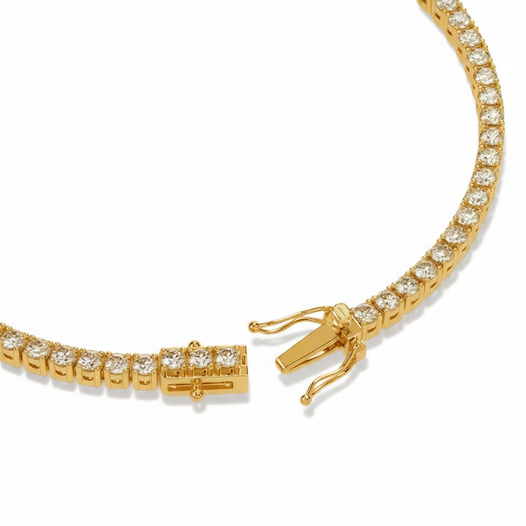 My Store 4 round diamond tennis bracelet in 14k yellow gold with a secure box clasp and four-prong settings.