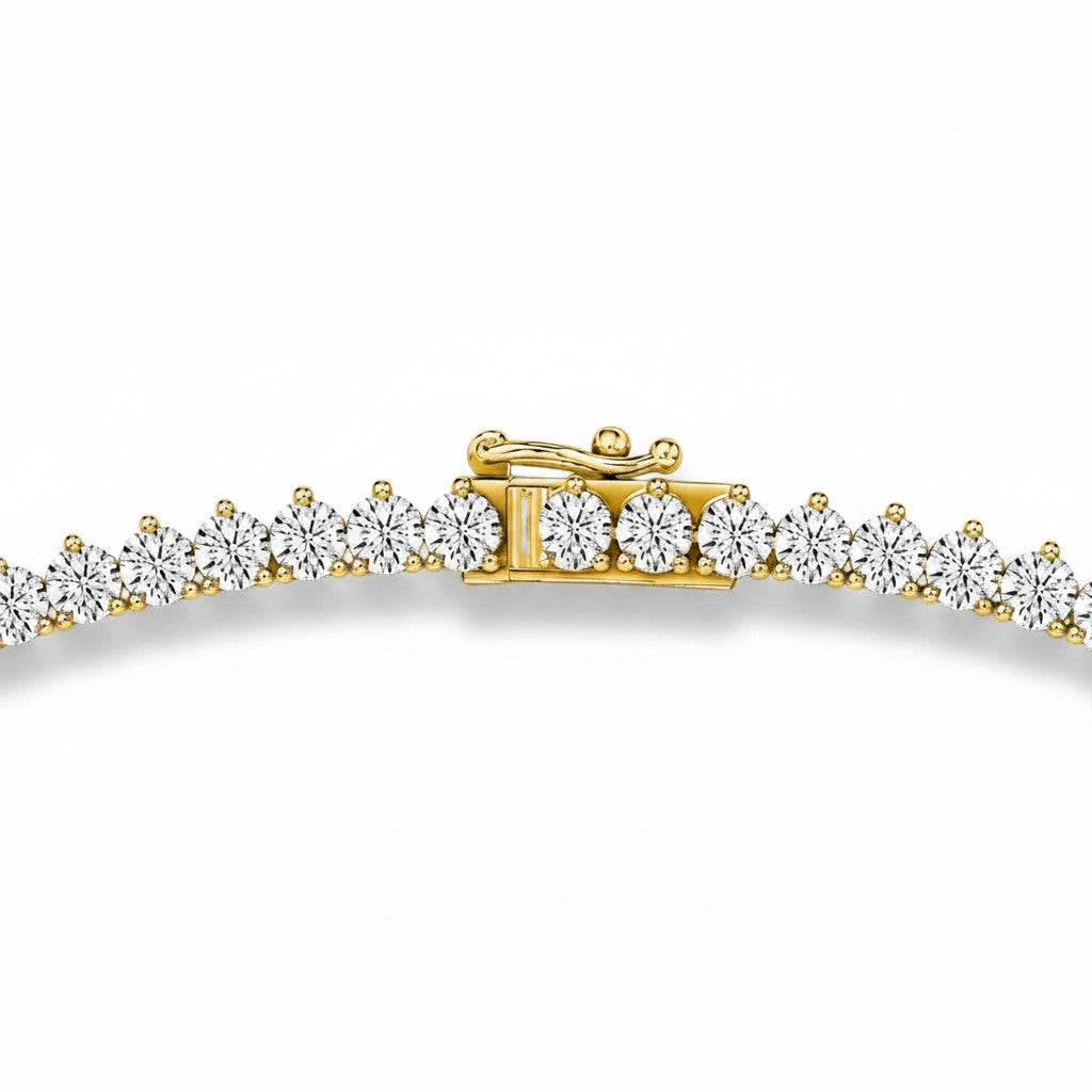 My Store 4 graduated Riviera diamond tennis necklace in yellow gold with a secure three-prong safety clasp closure.