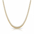 My Store 4 classic four-prong tennis necklace in 18K yellow gold with a continuous line of brilliant-cut diamonds.