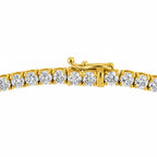 My Store 4 classic four-prong diamond tennis necklace in 18K yellow gold with a secure box clasp and safety latch.