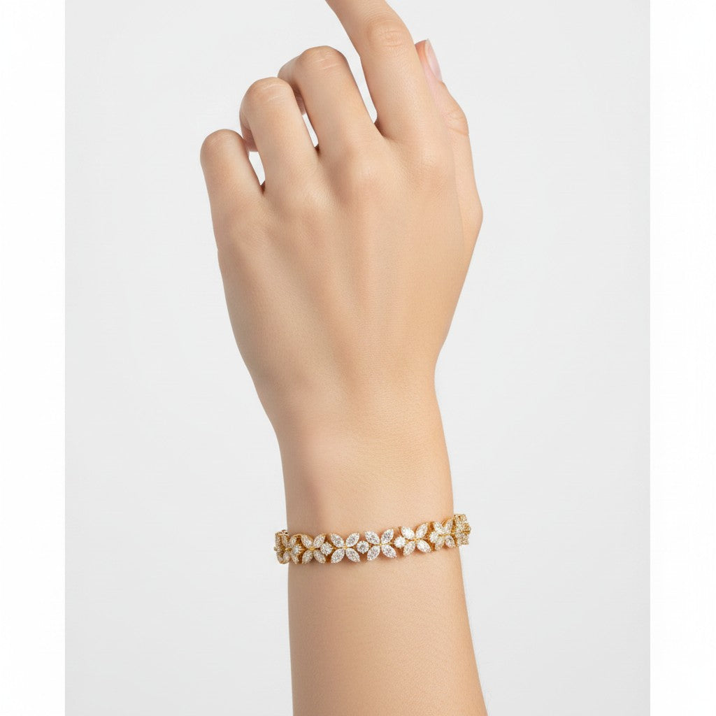 My Store 4 Bloomline gold floral diamond bracelet with marquise and round cut clusters worn on a wrist.