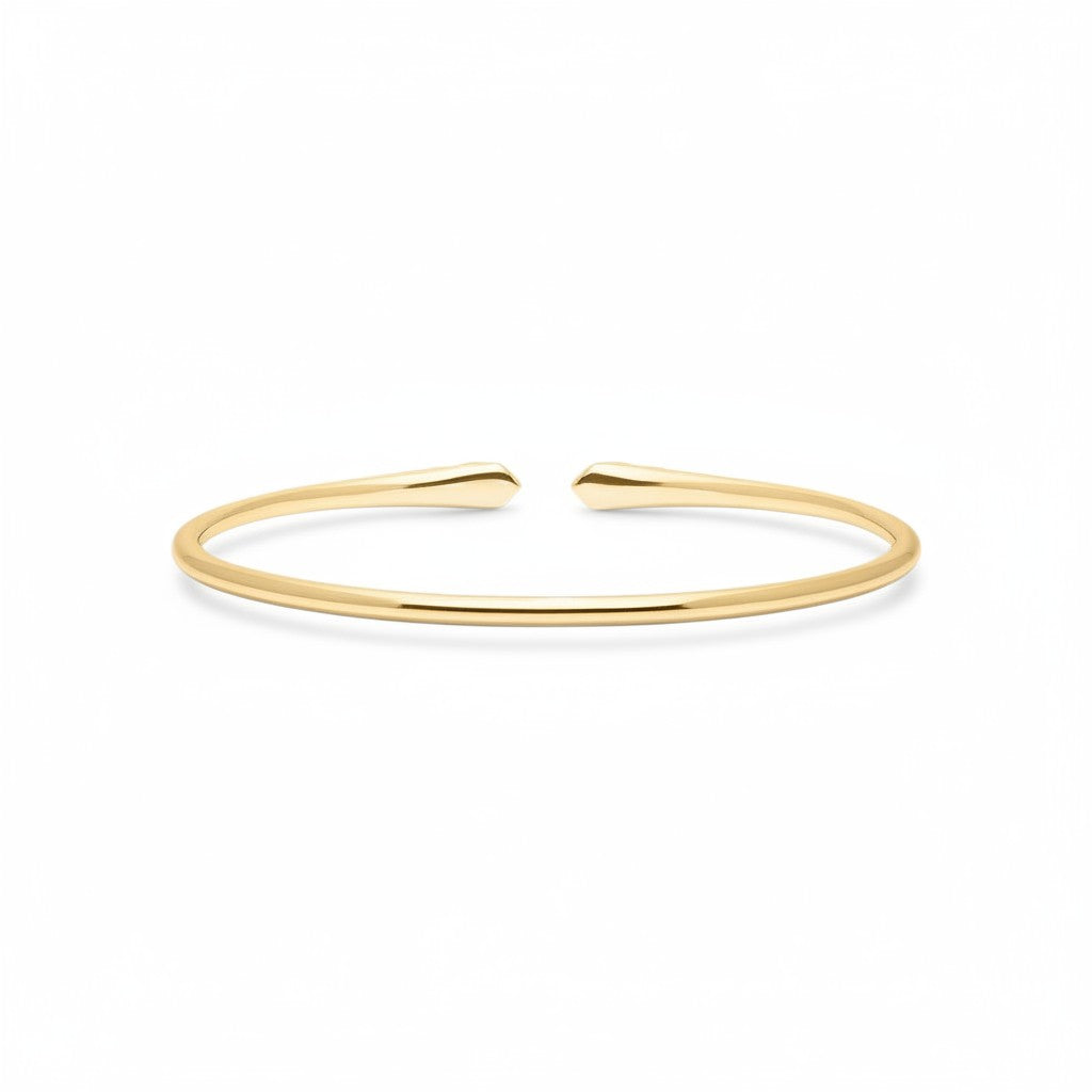 My Store 4 minimalist open cuff bracelet in polished yellow gold with a sleek, tapered design.