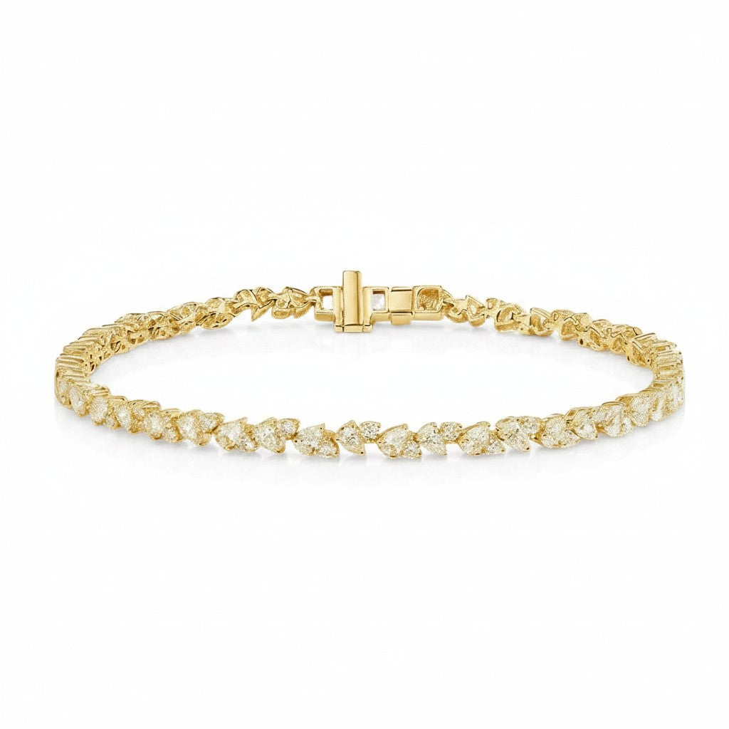 My Store 4 gold tennis bracelet featuring an alternating pattern of pear-cut and round-cut diamonds with a box clasp.