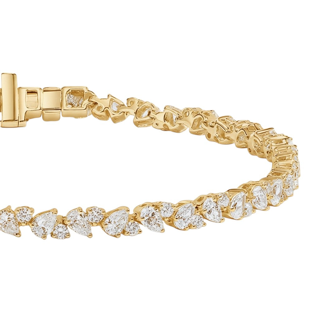 My Store 4 gold tennis bracelet featuring an alternating pattern of pear-cut and round-cut diamonds with a box clasp.