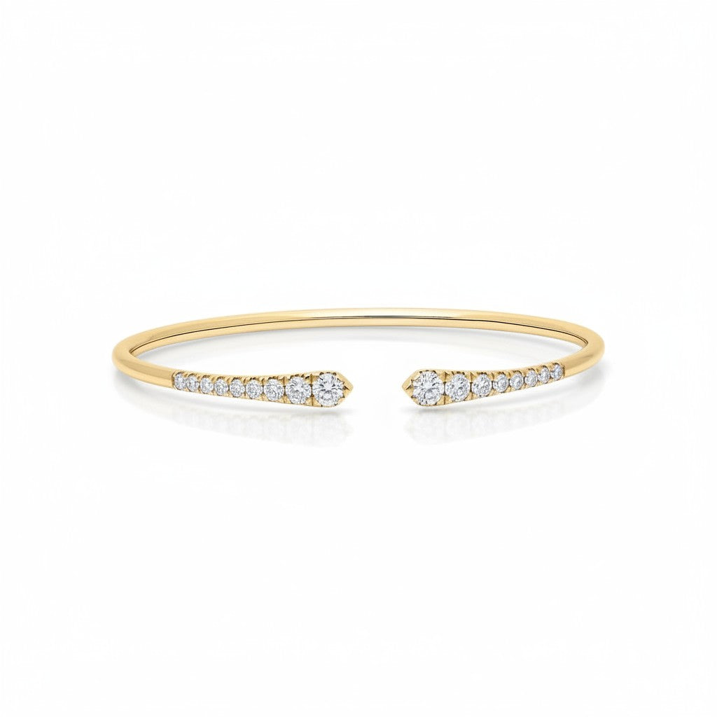 My Store 4 graduated diamond open cuff bracelet in polished yellow gold with round brilliant cut stones.