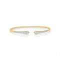 My Store 4 graduated diamond open cuff bracelet in polished yellow gold with round brilliant cut stones.