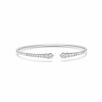 My Store 4 graduated diamond open cuff bracelet in polished white gold with round brilliant cut stones.