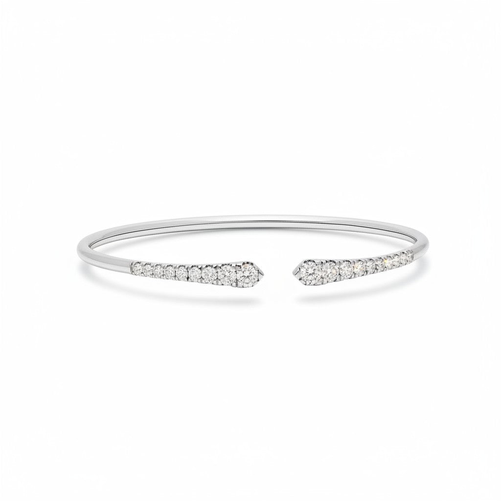 My Store 4 graduated diamond open cuff bracelet in polished white gold with round brilliant cut stones.
