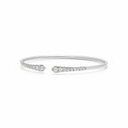 My Store 4 graduated diamond open cuff bracelet in polished white gold with round brilliant cut stones.