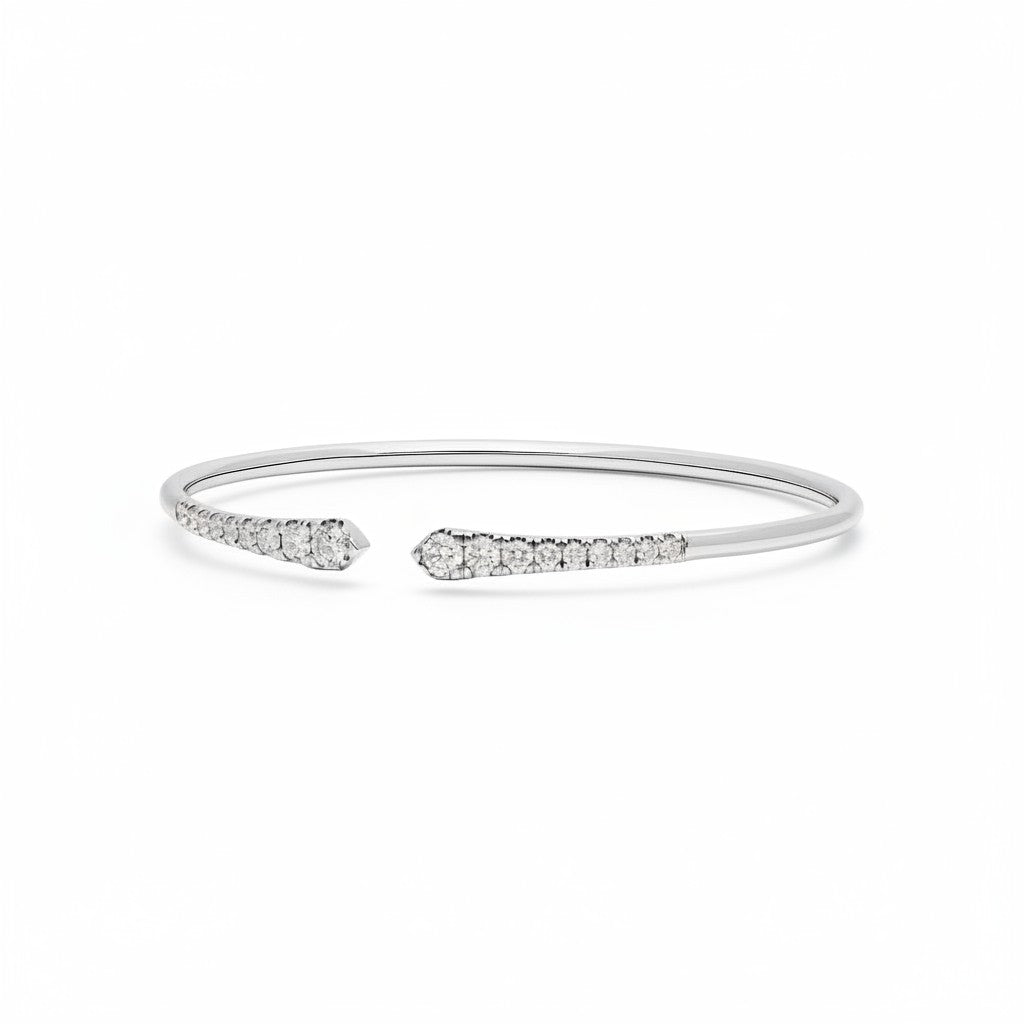 My Store 4 graduated diamond open cuff bracelet in polished white gold with round brilliant cut stones.
