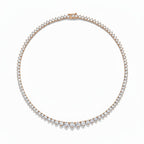 My Store 4 graduated Riviera diamond tennis necklace in 18K gold with a three-prong setting on a white background.