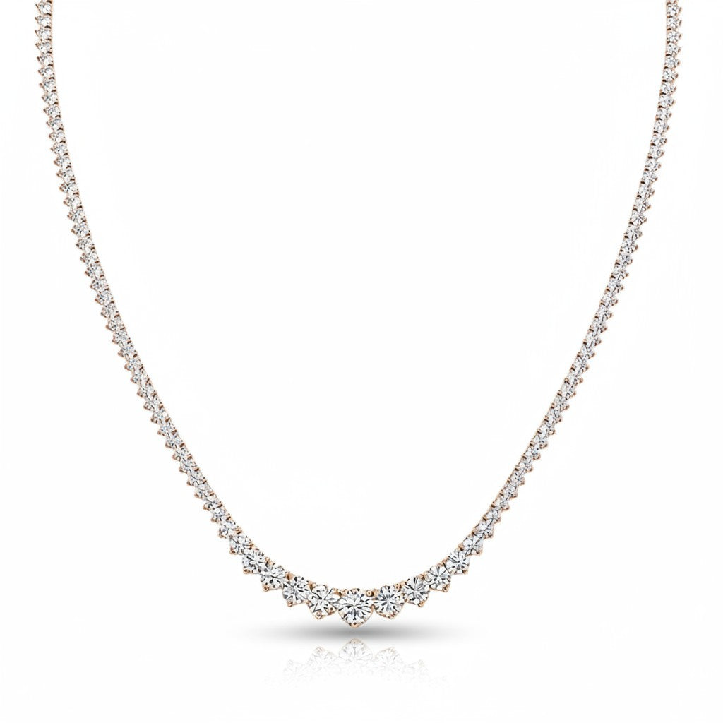 My Store 4 graduated Riviera diamond tennis necklace in 18K gold with a delicate three-prong setting.