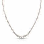 My Store 4 graduated Riviera diamond tennis necklace in 18K gold with a delicate three-prong setting.