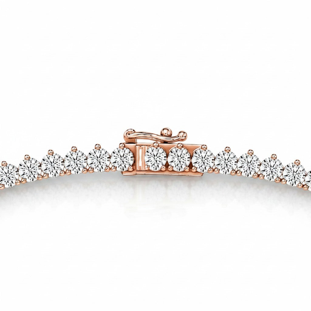 My Store 4 graduated Riviera diamond tennis necklace in rose gold with a secure three-prong setting and safety clasp.